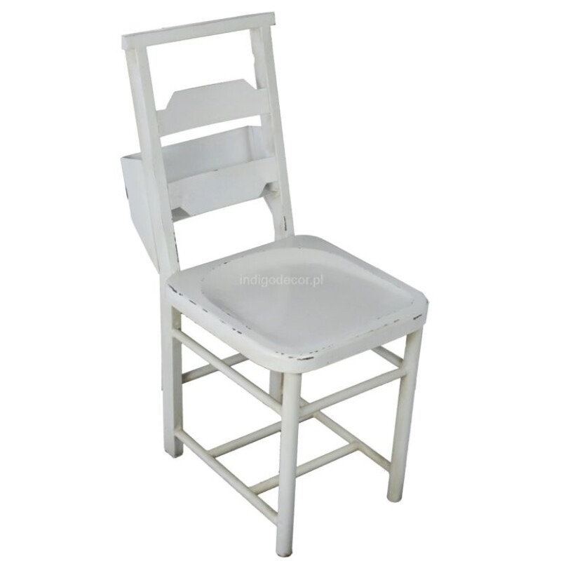 METAL CHAIR WITH A NEWSPAPER