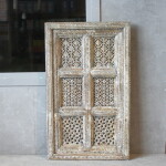 CARVED WOODEN DECORATIVE PANEL
