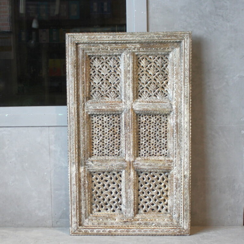 CARVED WOODEN DECORATIVE PANEL